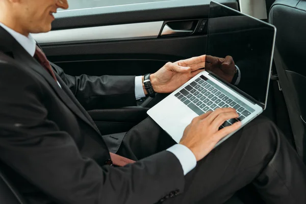 Cropped View Businessman Using Laptop Blank Screen Taxi — Stock Photo, Image
