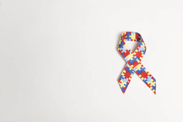 top view of symbol of autism on grey background 