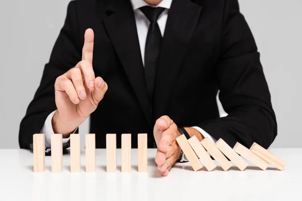 Cropped View Businessman Suit Preventing Wooden Blocks Falling Showing Idea — ストック写真