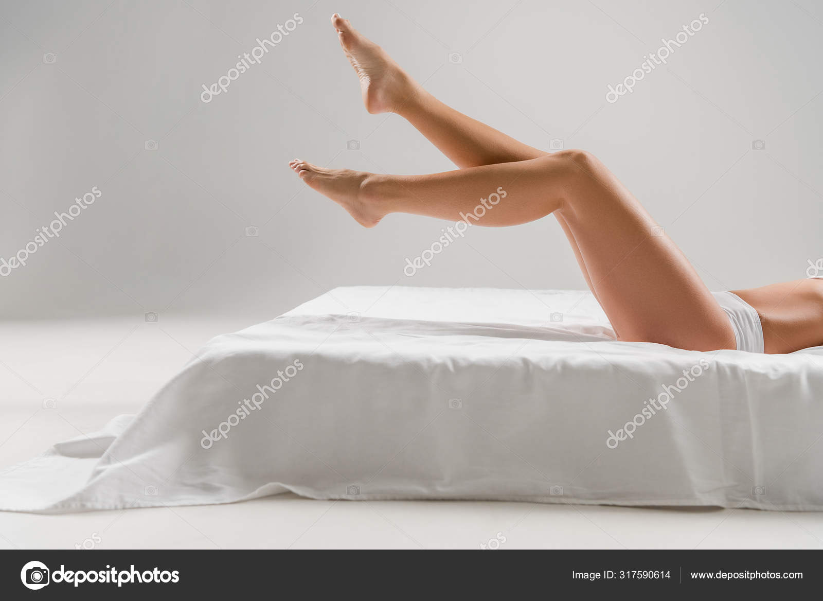 Cropped View Of Sexy Girl In Underwear On Bed Stock Photo, Picture