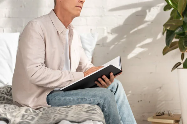 Cropped View Man Holding Notebook Bed — Stock Photo, Image