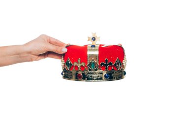 cropped view of woman holding red crown, isolated on white clipart