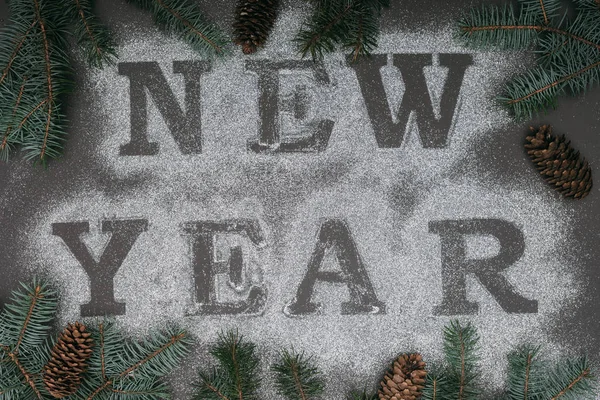Top View New Year Lettering Frame Spruce Branches Pine Cones — Stock Photo, Image