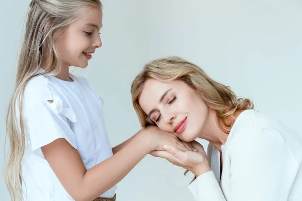 Attractive Mother Closed Eyes Holding Hands Smiling Daughter Isolated Grey — Stock Photo, Image