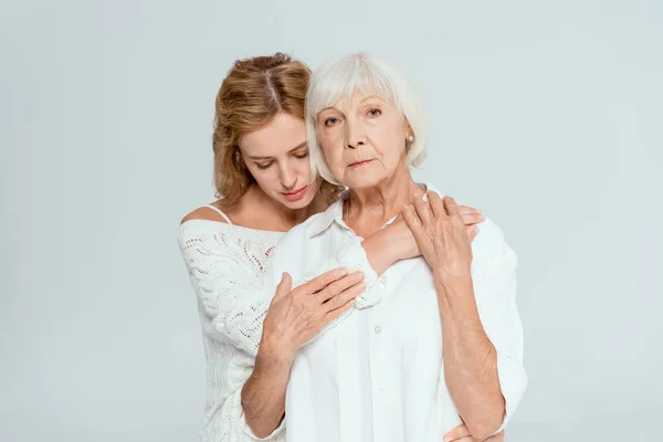 Attractive Mother Daughter Hugging Looking Camera Isolated Grey — Stock Photo, Image