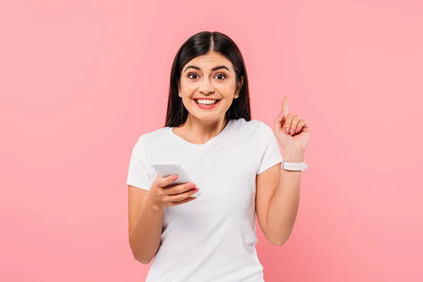 Smiling Pretty Brunette Girl Using Smartphone Showing Ideda Gesture Isolated — Stock Photo, Image