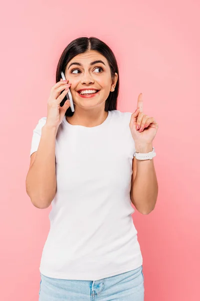 Smiling Pretty Brunette Girl Talking Smartphone Showing Idea Gesture Isolated — Stock Photo, Image