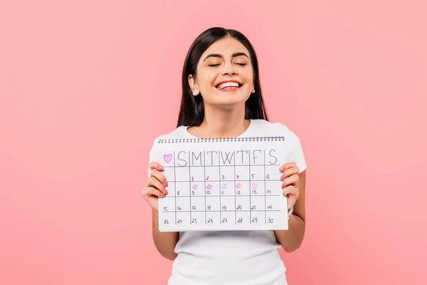 Feliz Menina Morena Bonita Segurando Calendário Período Isolado Rosa — Fotografia de Stock