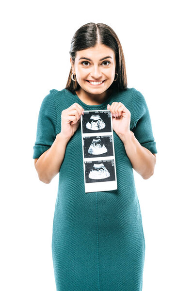happy pregnant girl holding fetal ultrasound images isolated on white