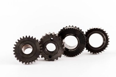 metal round gears in row on white background clipart