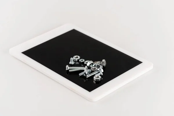 Metal Screws Bolts Digital Tablet Isolated White — Stock Photo, Image