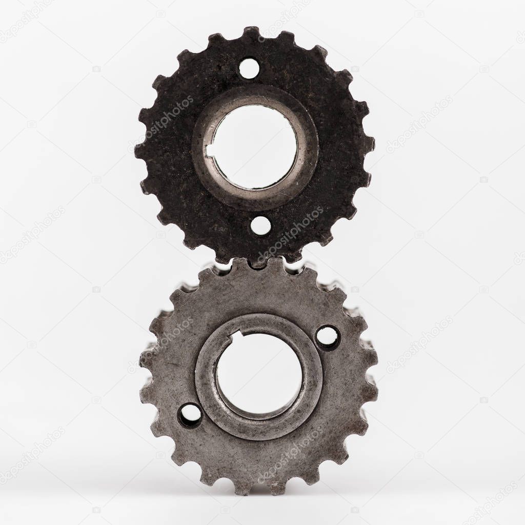 metal round gears on white background