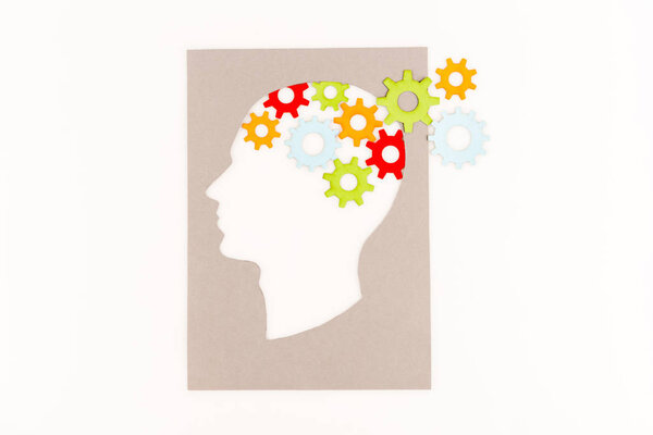 top view of human head silhouette with gears isolated on white