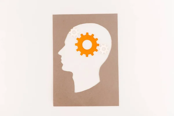 Top View Human Head Silhouette Orange Gear Isolated White — Stock Photo, Image