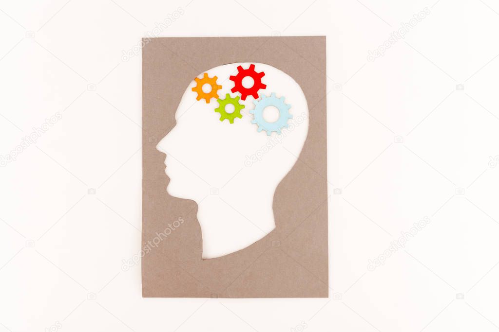 top view of human head silhouette with gears isolated on white