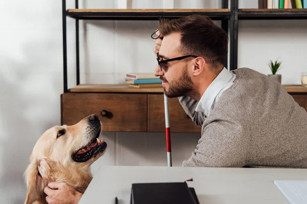 Side View Blind Man Walking Stick Petting Golden Retriever Table — Stock Photo, Image