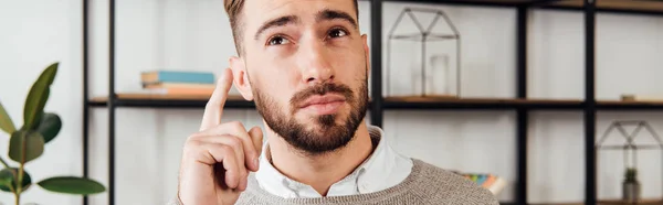 Pensive Man Pointing Finger Panoramic Shot — Stock Photo, Image