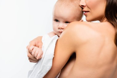 cropped view of naked mother hugging baby boy, isolated on white clipart