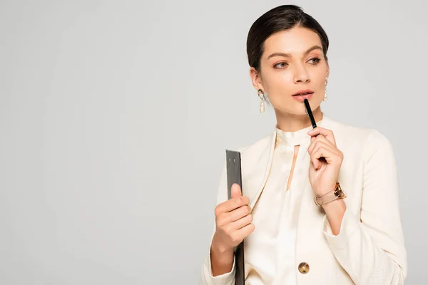 Pensive Businesswoman White Suit Holding Clipboard Pen Isolated Grey — Stock Photo, Image