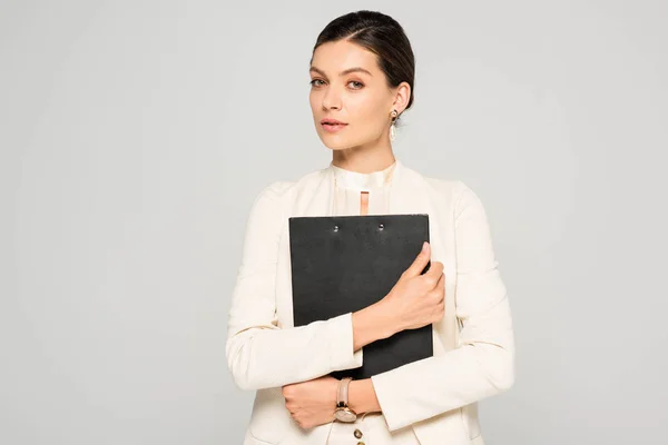 Confident Businesswoman White Suit Holding Clipboard Isolated Grey — Stock Photo, Image