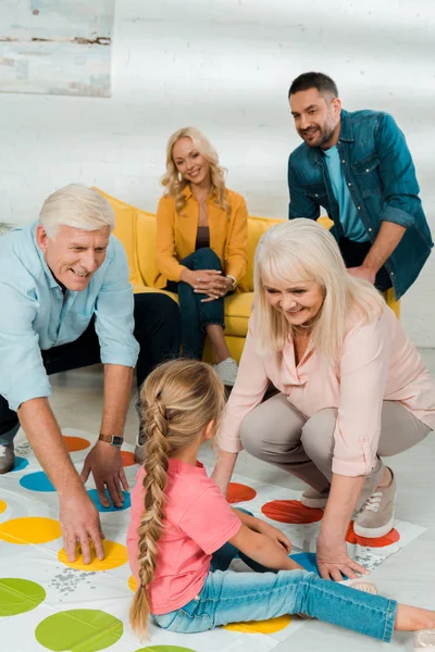 Kyiv Ukraine November 2019 Cheerful Grandparents Granddaughter Playing Twister Game — Stock Photo, Image