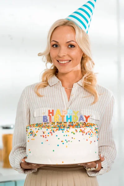 Happy Woman Party Cap Holding Birthday Cake Colorful Candles Happy — Stock Photo, Image