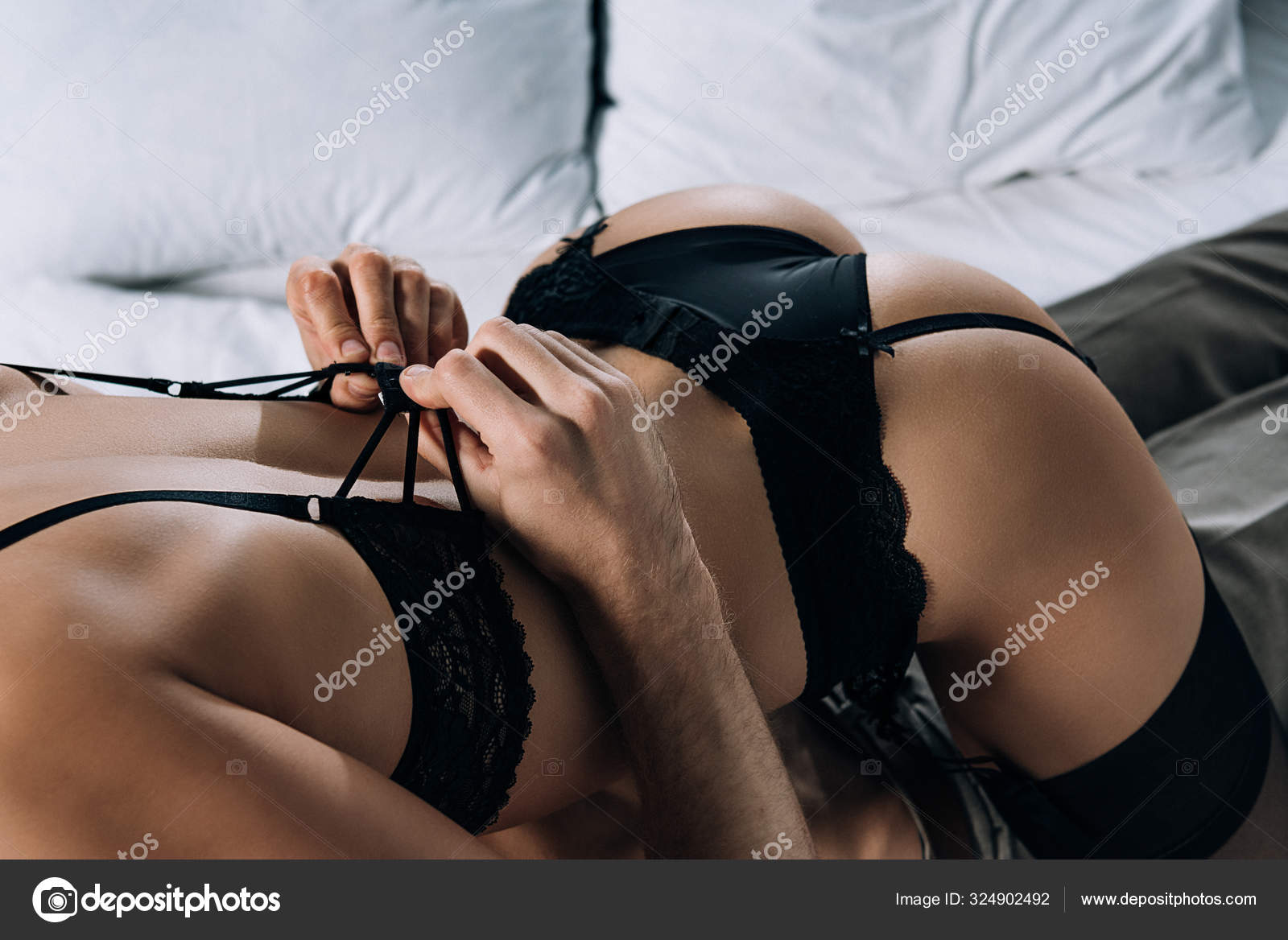 Cropped View Man Taking Bra Sexy Woman While Lying Bed Stock Photo