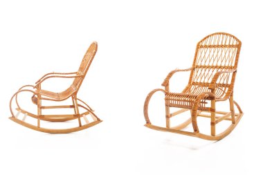 Wooden rocking chairs on white background clipart