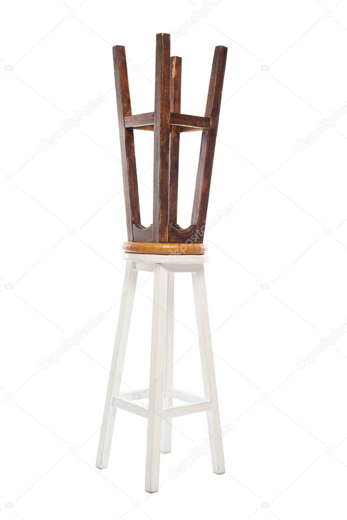 Brown and white wooden chairs isolated on white