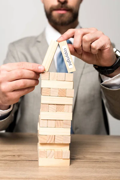 Partial View Businessman Playing Blocks Wood Tower Game Copyright Inscription — Stock Photo, Image