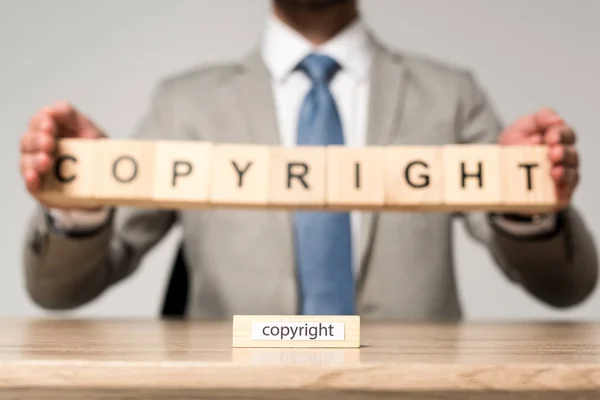 Selective Focus Wooden Block Word Copyright Businessman Holding Wooden Cubes — Stock Photo, Image