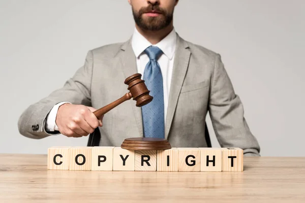 Cropped View Judge Holding Gavel Wooden Cubes Copyright Inscription Isolated — Stock Photo, Image