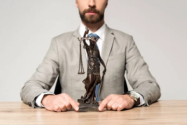 Partial View Lawyer Showing Themis Statue While Sitting Desk Isolated — 스톡 사진