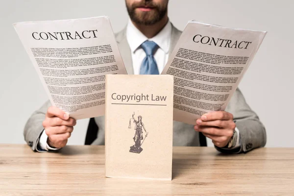 Partial View Lawyer Looking Contracts Book Copyright Law Title Isolated — Stock Photo, Image