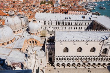 VENICE, ITALY - SEPTEMBER 24, 2019: high angle view of Cathedral Basilica of Saint Mark and palace of doge in Venice, Italy  clipart