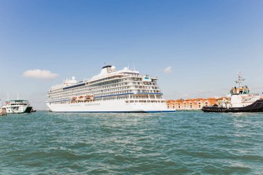 Cruise Ship and ships floating on river in Venice, Italy  clipart