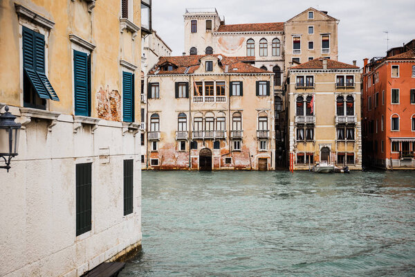 ancient and colorful buildings and canal in Venice, Italy 