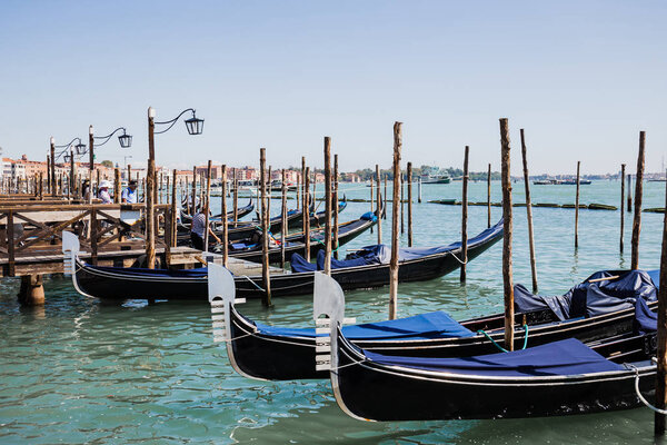 VENICE, ITALY - SEPTEMBER 24, 2019: canal with blue gondolas in Venice, Italy 
