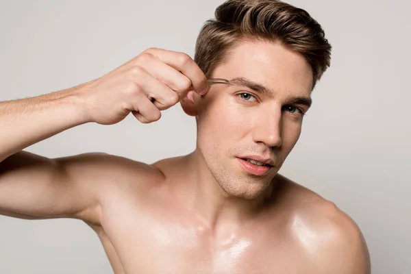 Sexy Man Bare Torso Pinching Brows Tweezers Isolated Grey — Stock Photo, Image