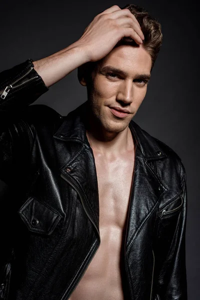Handsome Sexy Young Man Biker Jacket Touching Hair Black Background — 스톡 사진