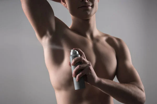 Cropped View Shirtless Man Spraying Deodorant Underarm Isolated Grey — 스톡 사진