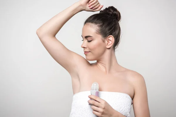 Happy Woman Looking Underarm While Holding Deodorant Isolated Grey — Stock Photo, Image