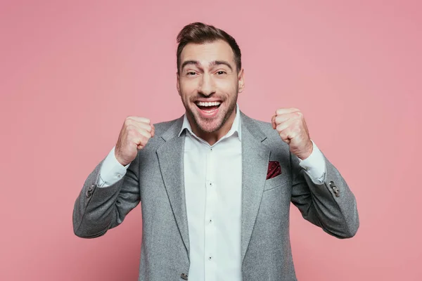 Excited Successful Man Gesturing Grey Suit Isolated Pink — Stockfoto