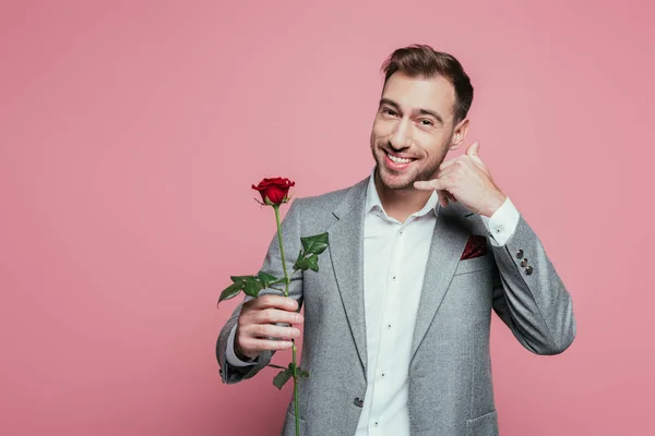 Cheerful Man Holding Rose Showing Call Gesture Isolated Pink — Stock Photo, Image