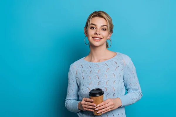 Cheerful Girl Smiling Camera While Holding Coffee Blue Background — 스톡 사진