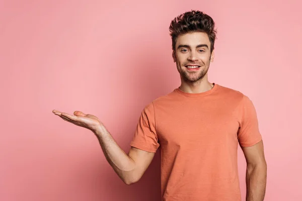 Happy Young Man Smiling Camera While Standing Open Arm Pink — Stock Photo, Image