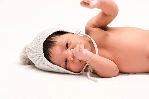 Cute Mixed Race Newborn Baby Knitted Hat Lying White — Stock Photo, Image