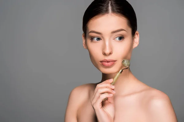 Beautiful Naked Girl Using Jade Massage Roller Isolated Grey — Stock Photo, Image