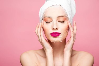 naked woman in moisturizing face mask with closed eyes isolated on pink 