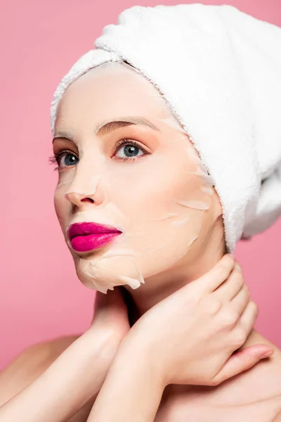 Young Woman Moisturizing Face Mask Touching Neck Isolated Pink — Stock Photo, Image